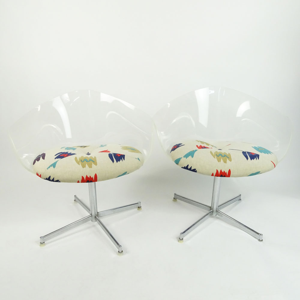 Pair of Mid Century Modern Lucite and Chrome Swivel Chairs.