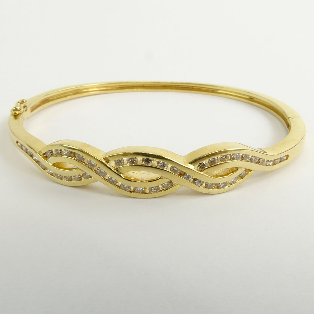 Vintage 14 Karat Yellow Gold and Round Cut Diamond Bangle Bracelet.