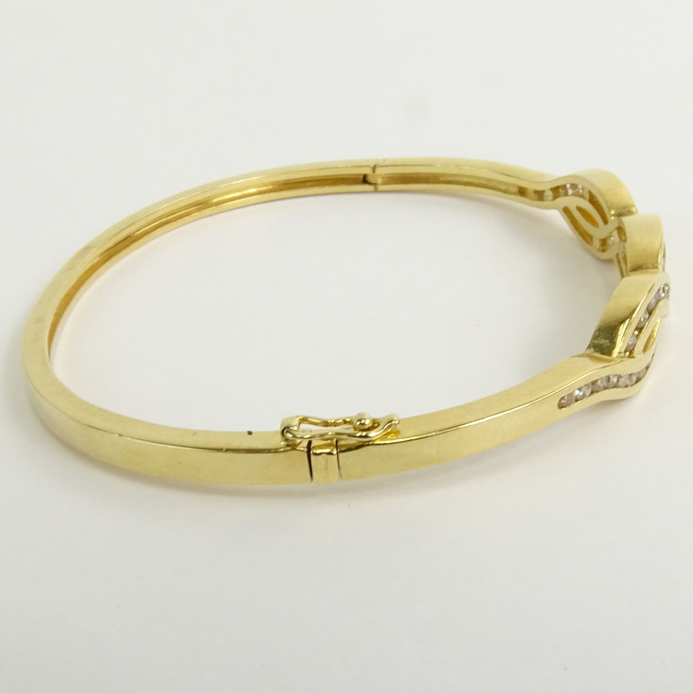 Vintage 14 Karat Yellow Gold and Round Cut Diamond Bangle Bracelet.