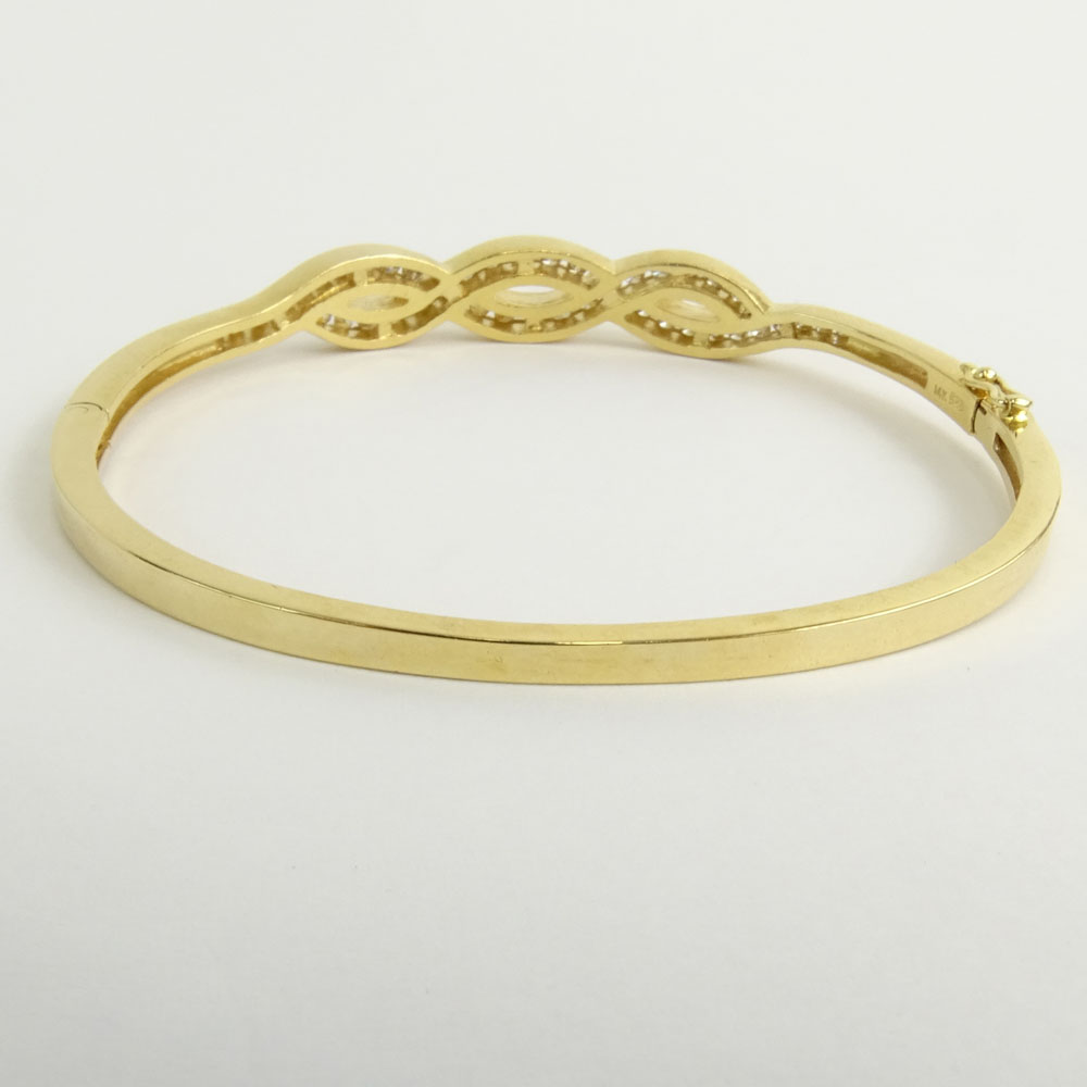 Vintage 14 Karat Yellow Gold and Round Cut Diamond Bangle Bracelet.