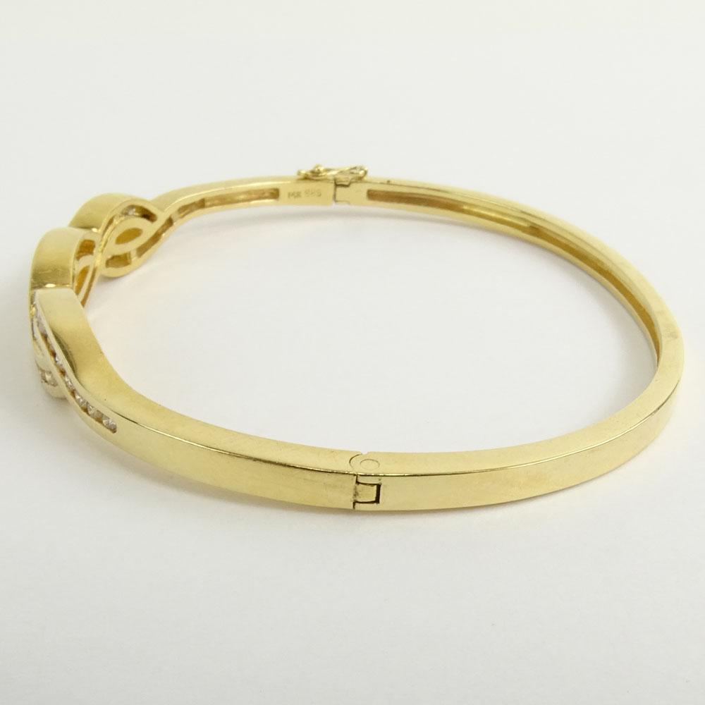 Vintage 14 Karat Yellow Gold and Round Cut Diamond Bangle Bracelet.