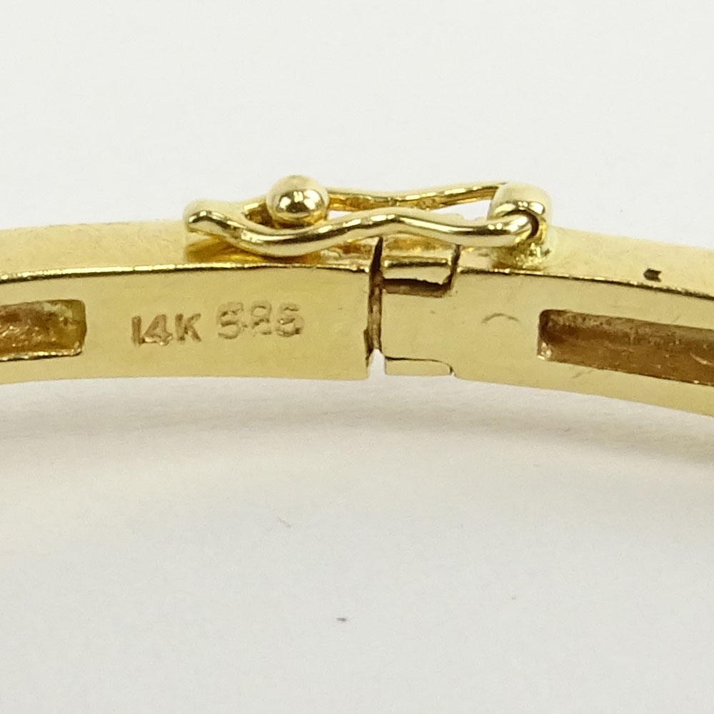 Vintage 14 Karat Yellow Gold and Round Cut Diamond Bangle Bracelet.
