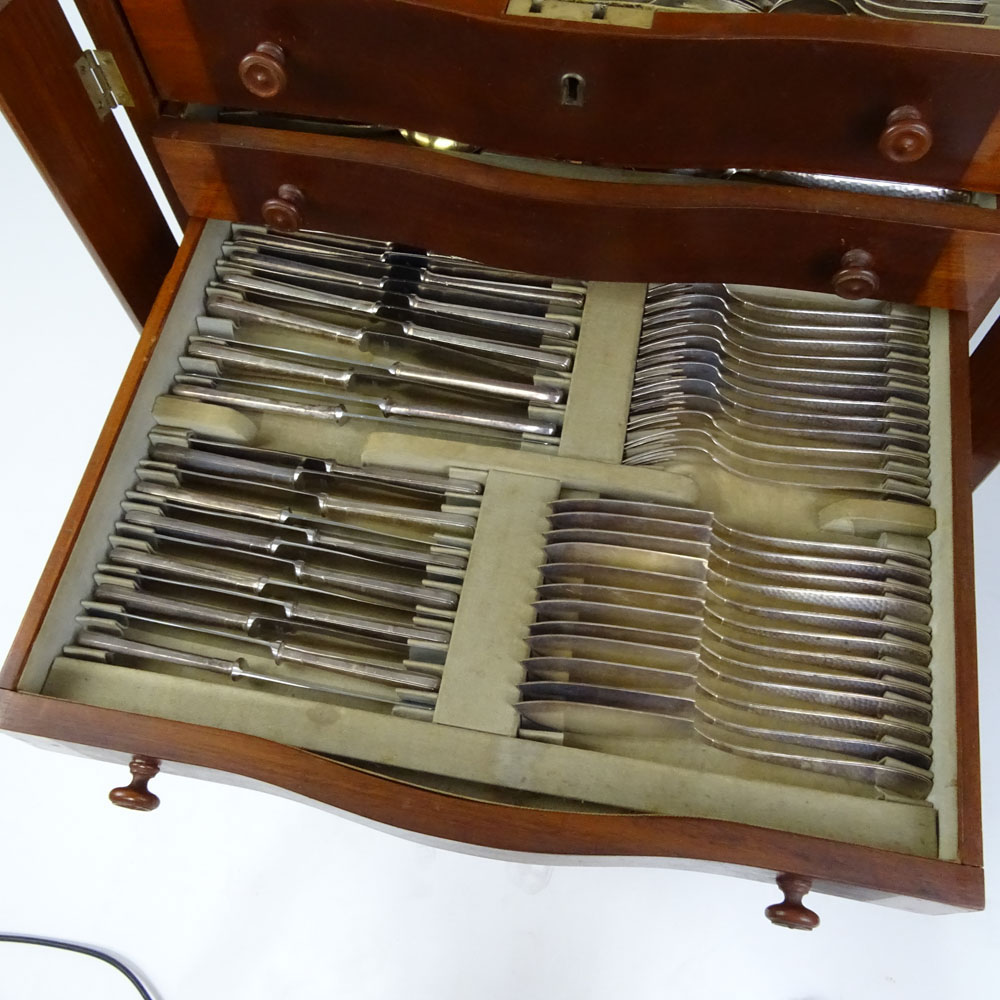 One Hundred Eighty Four Piece Arts & Crafts Sterling Silver Flatware in Fitted Custom Cabinet.