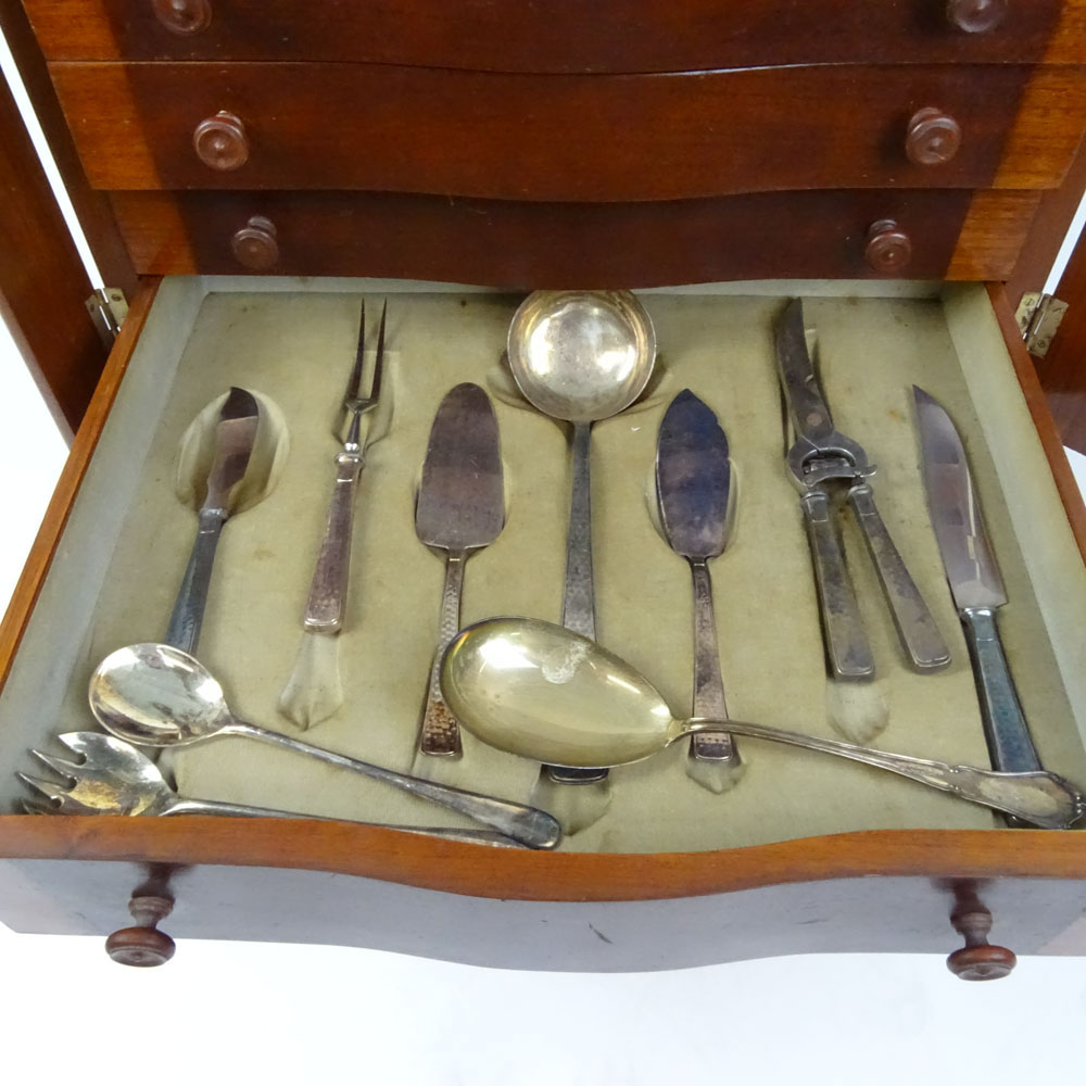 One Hundred Eighty Four Piece Arts & Crafts Sterling Silver Flatware in Fitted Custom Cabinet.