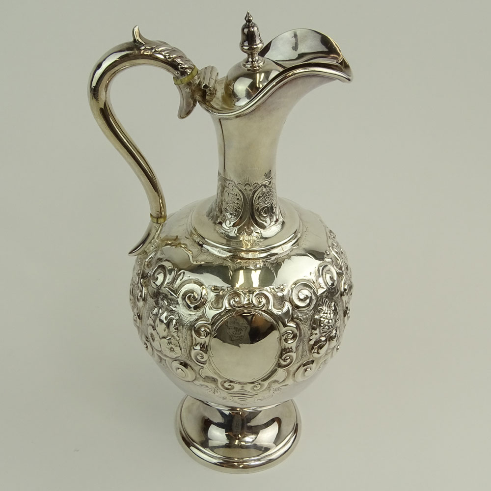 Mid 19th Century English Silver Ewer. Fruit and foliate motif.