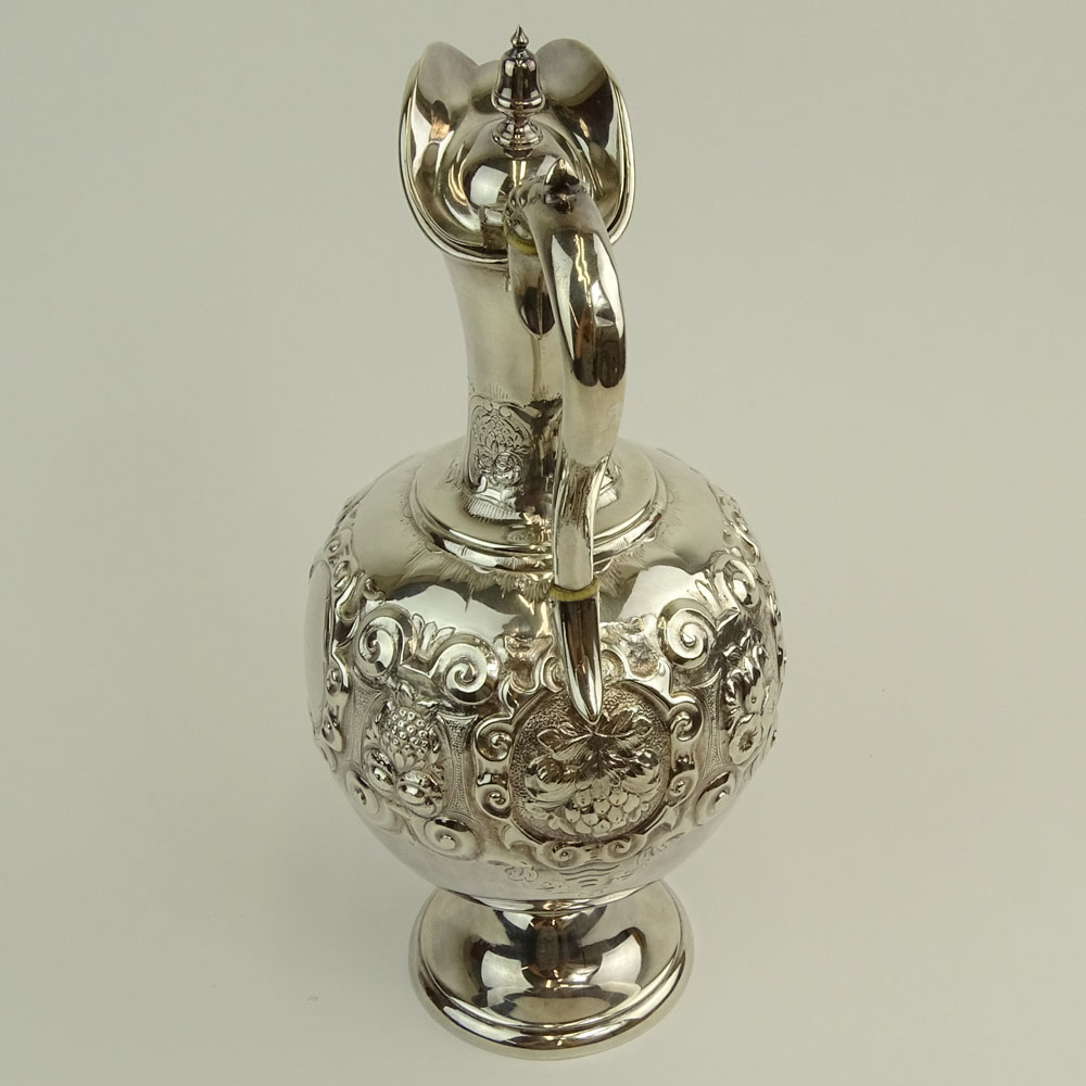 Mid 19th Century English Silver Ewer. Fruit and foliate motif.