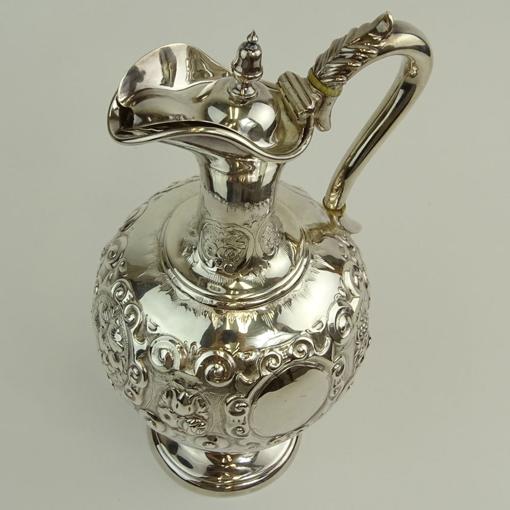 Mid 19th Century English Silver Ewer. Fruit and foliate motif.