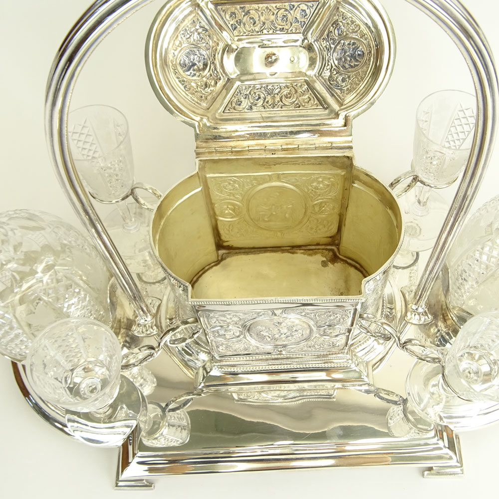 Fine Antique English Silverplate and Crystal Seven (7) Piece Decanter Set with Biscuit Box.