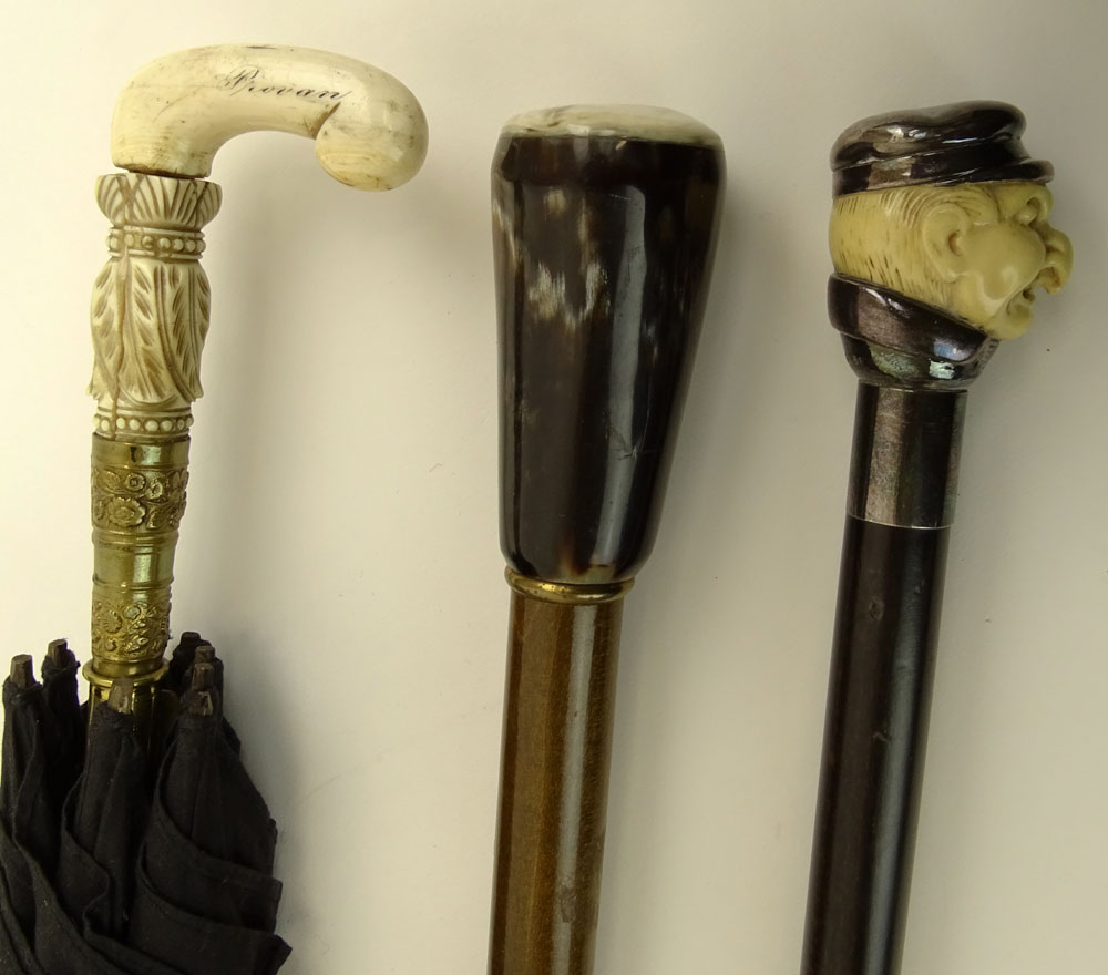 Lot of Three (3) Antique Umbrella and Canes.