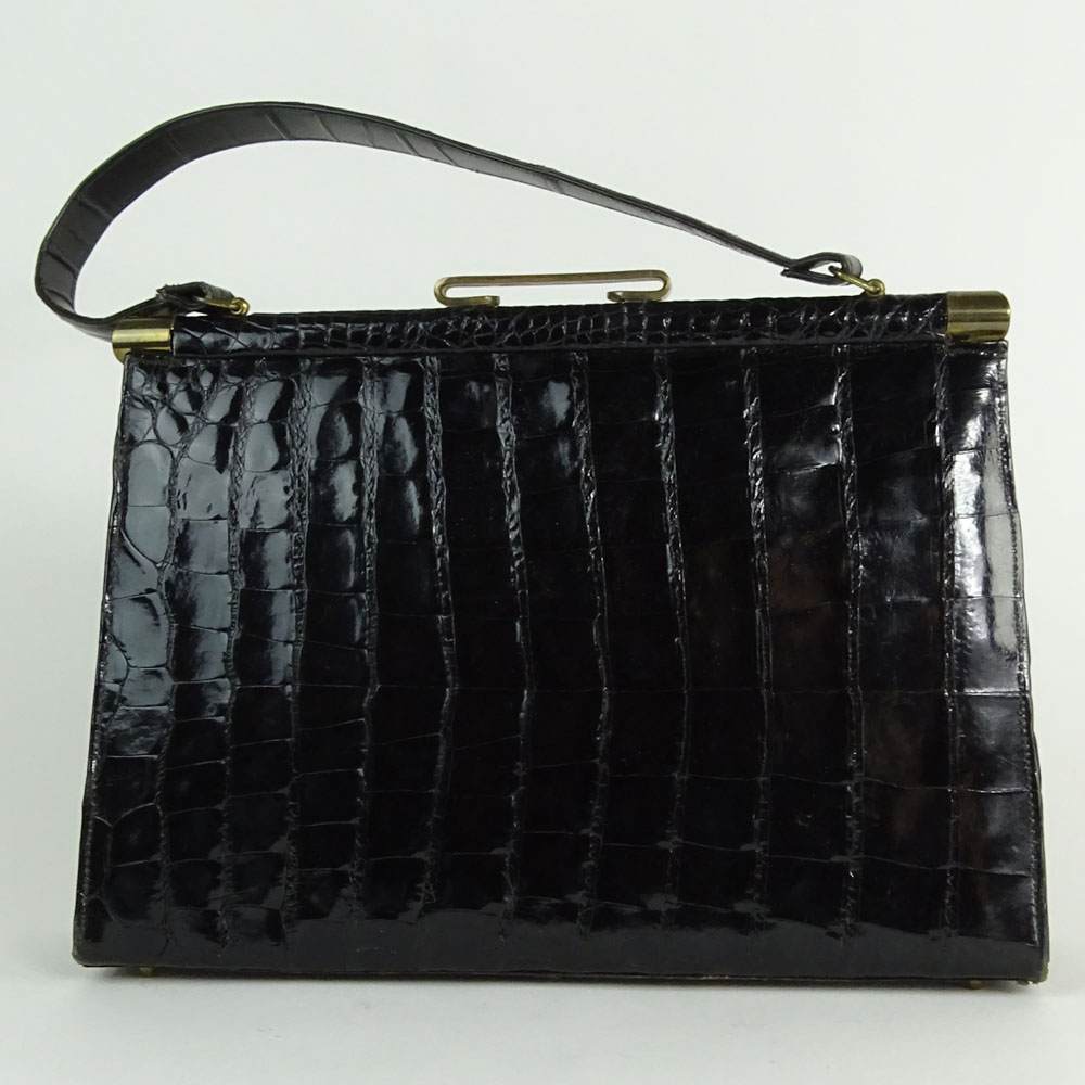 Vintage Alligator Handbag. Rich black color. Leather interior.