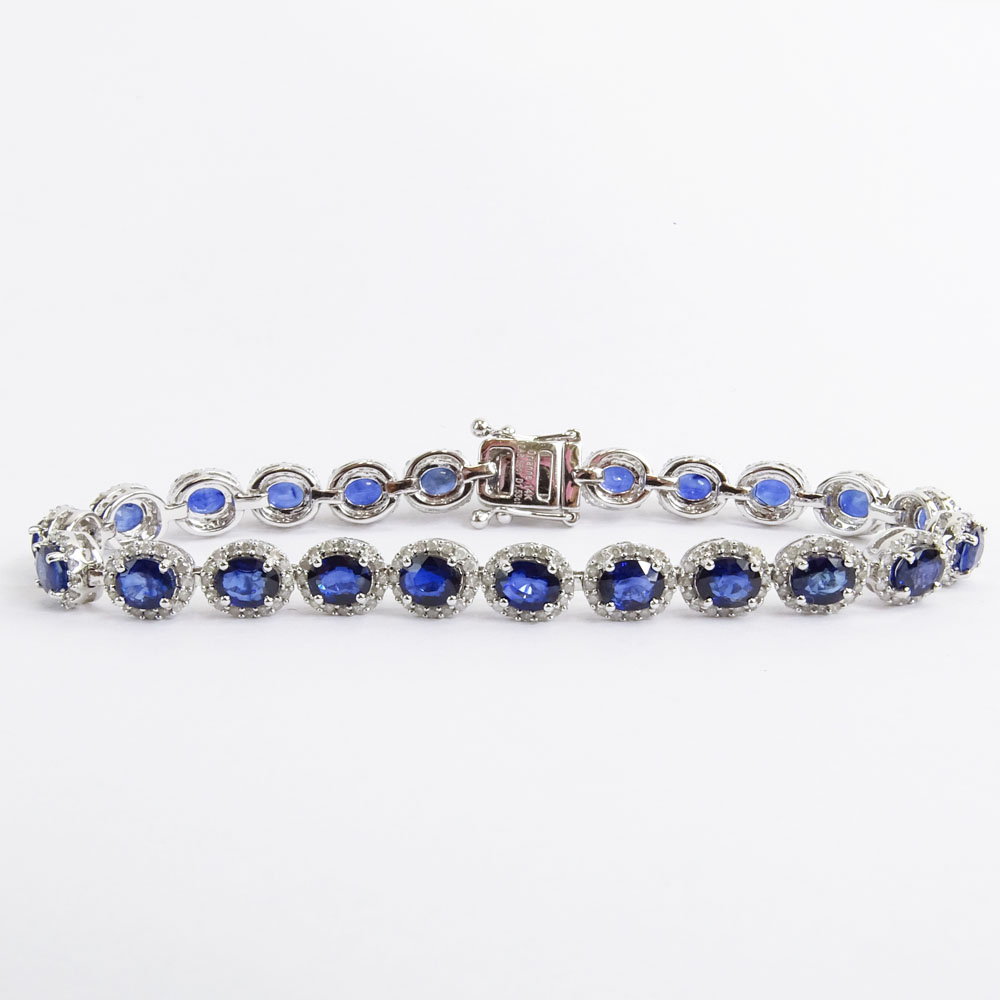 AIG Certified 9.56 Carat Oval Cut Sapphire, 1.53 Carat Round Brilliant Cut Diamond and 14 Karat White Gold Bracelet. 