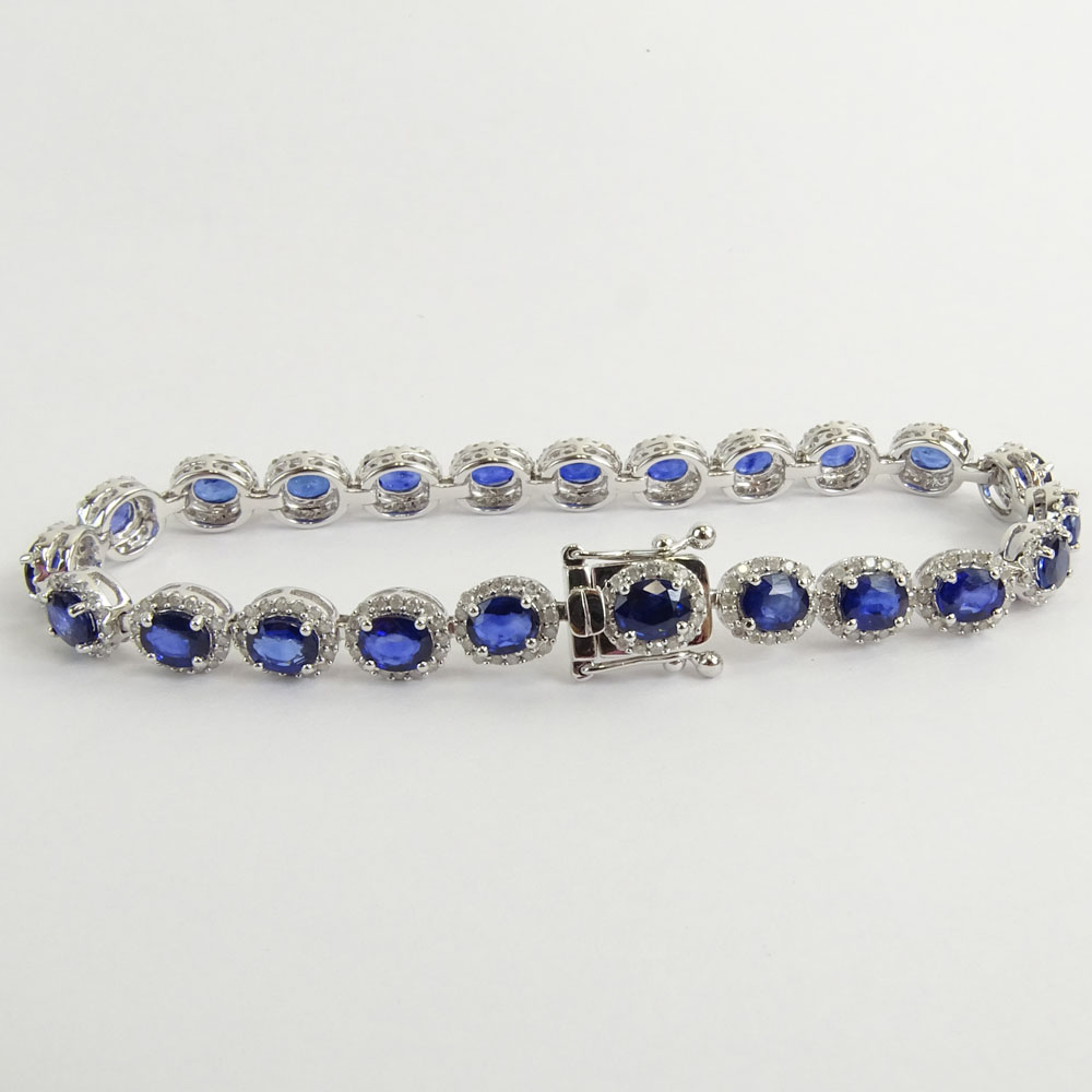 AIG Certified 9.56 Carat Oval Cut Sapphire, 1.53 Carat Round Brilliant Cut Diamond and 14 Karat White Gold Bracelet. 