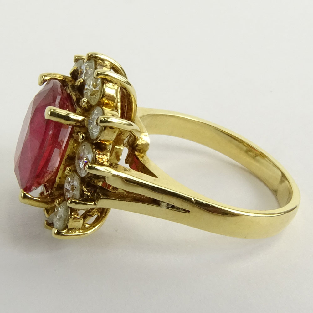 GLA Certified 3.57 Carat Oval Cut Ruby, 1.03 Carat Round Cut Diamond and 14 Karat Yellow Gold Ring. 