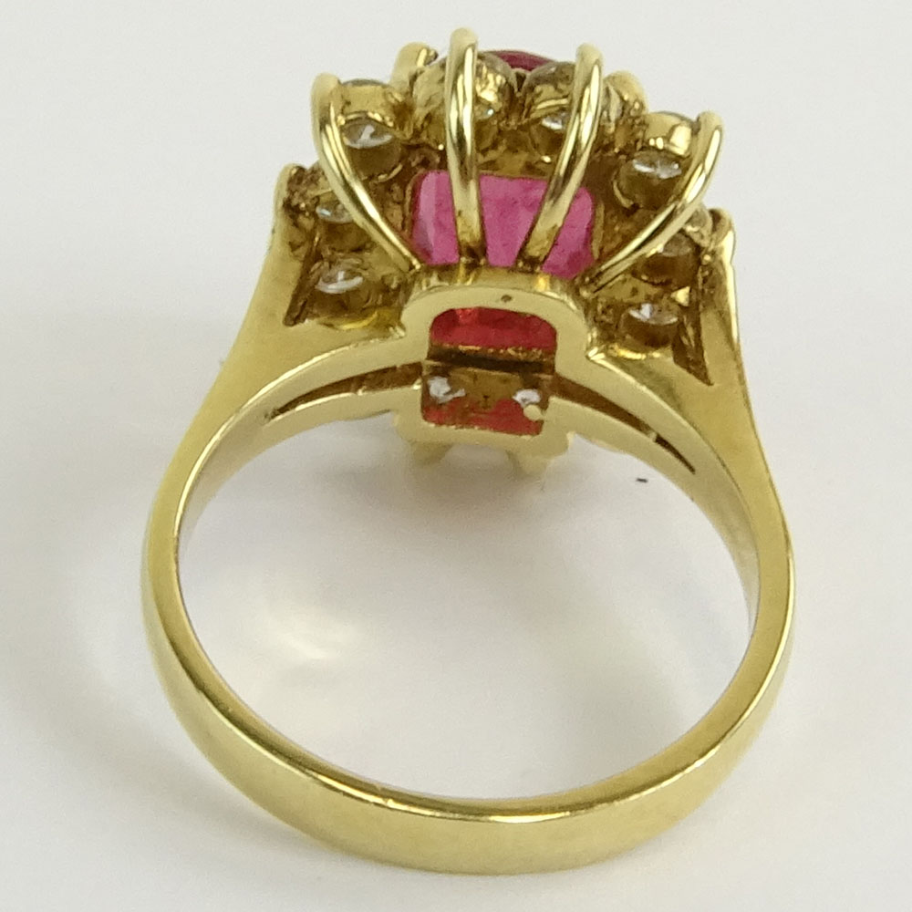 GLA Certified 3.57 Carat Oval Cut Ruby, 1.03 Carat Round Cut Diamond and 14 Karat Yellow Gold Ring. 