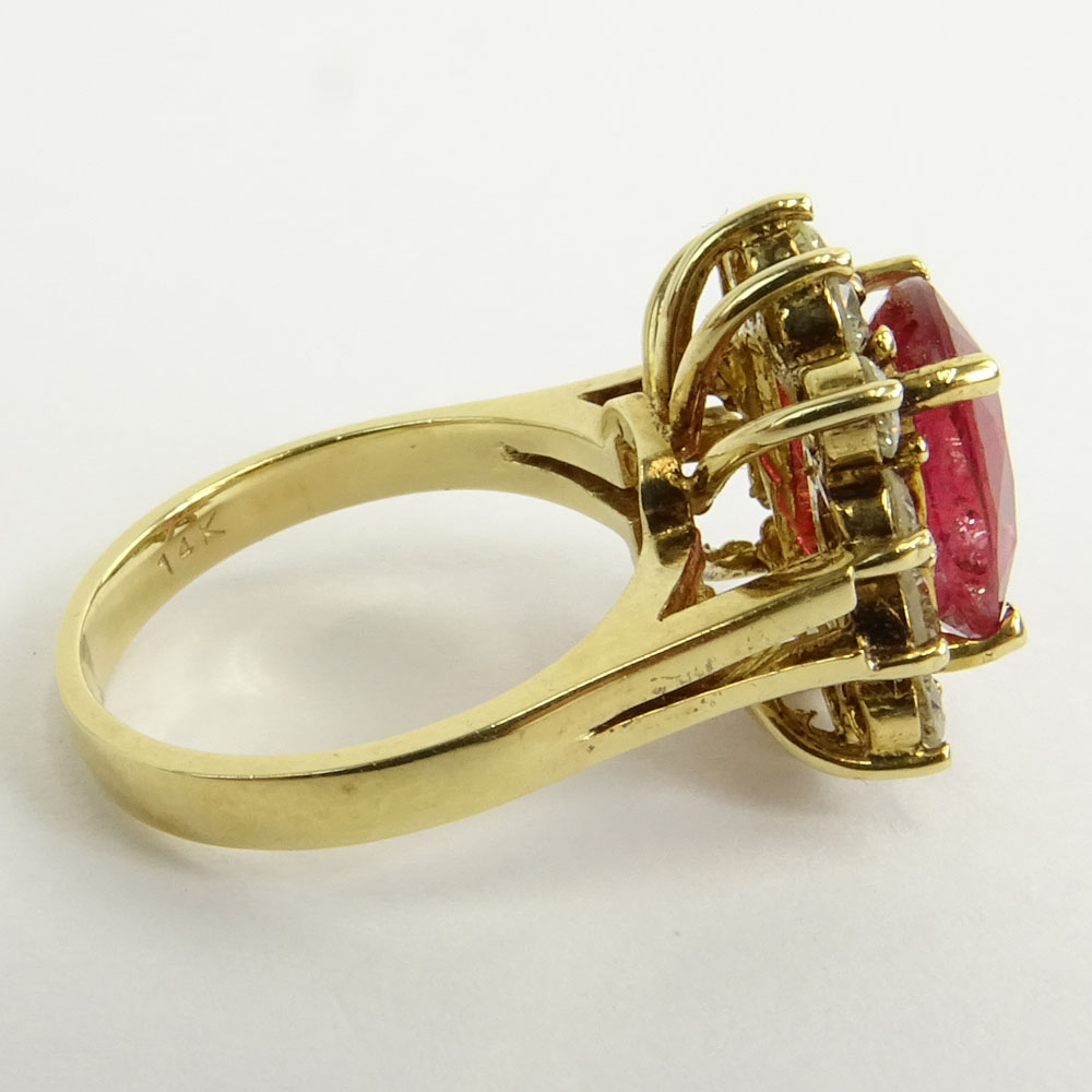 GLA Certified 3.57 Carat Oval Cut Ruby, 1.03 Carat Round Cut Diamond and 14 Karat Yellow Gold Ring. 