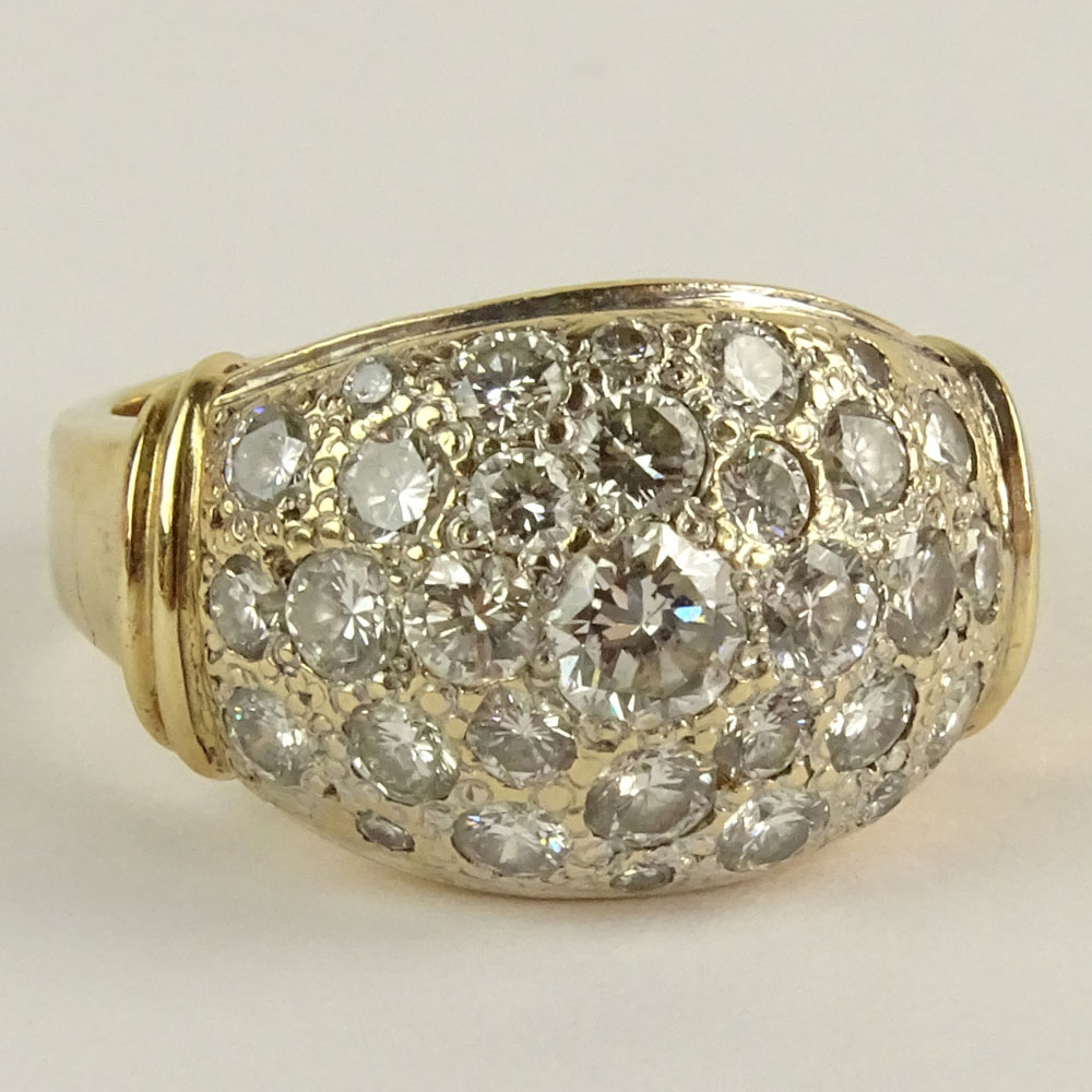 Lady's Pave Set Round Brilliant Cut Diamond and 14 Karat yellow Gold Ring.