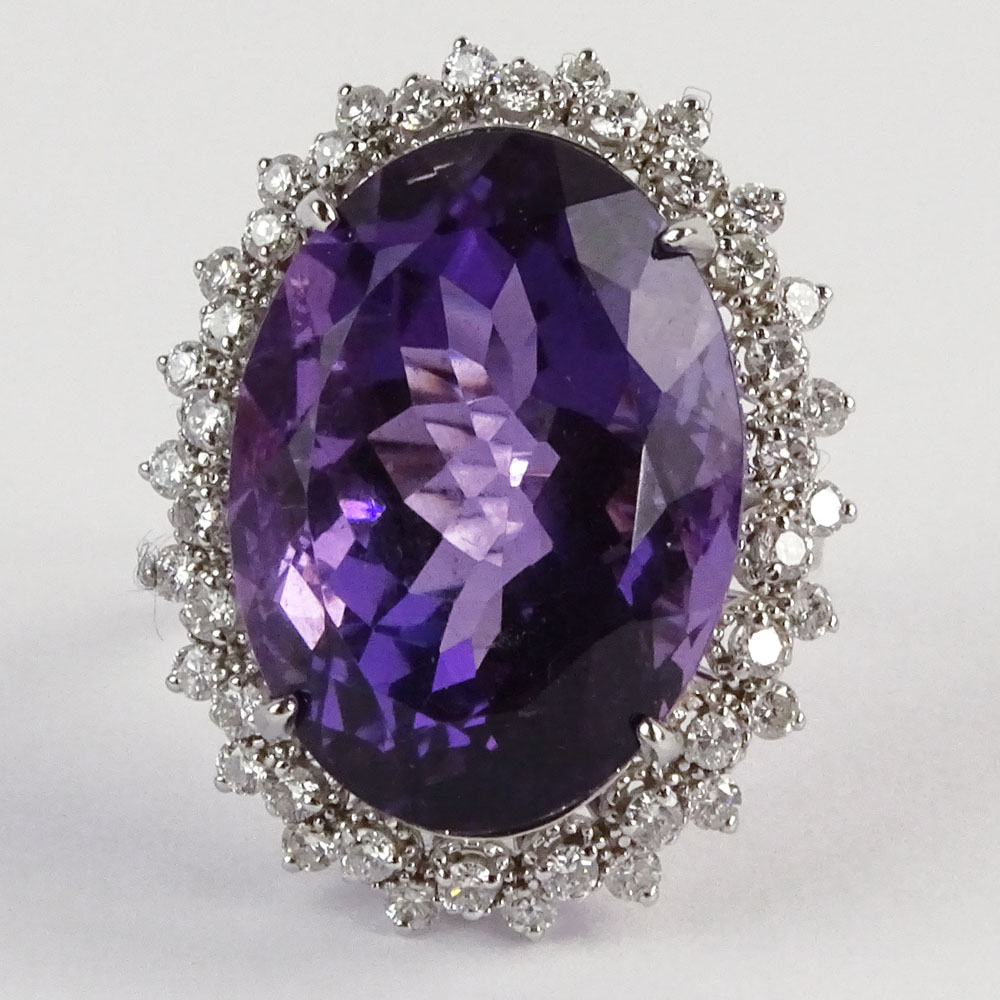 Large Oval Cut Amethyst, Diamond and 14 Karat White Gold Ring. 