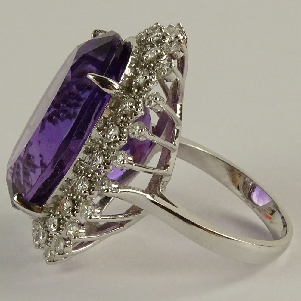 Large Oval Cut Amethyst, Diamond and 14 Karat White Gold Ring. 