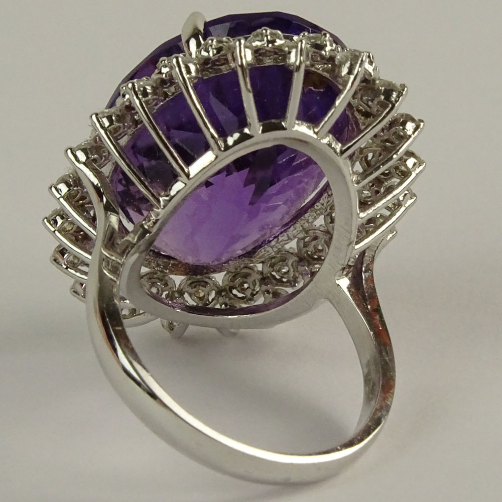 Large Oval Cut Amethyst, Diamond and 14 Karat White Gold Ring. 