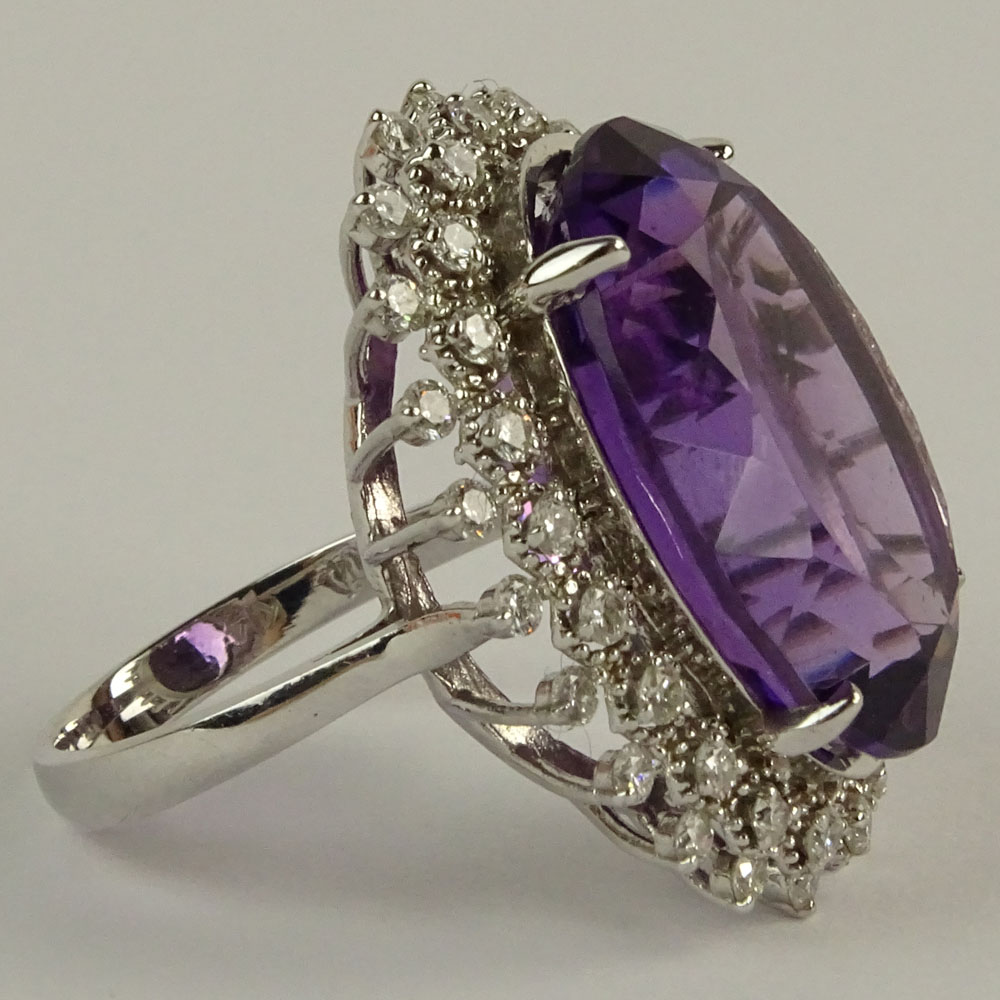 Large Oval Cut Amethyst, Diamond and 14 Karat White Gold Ring. 