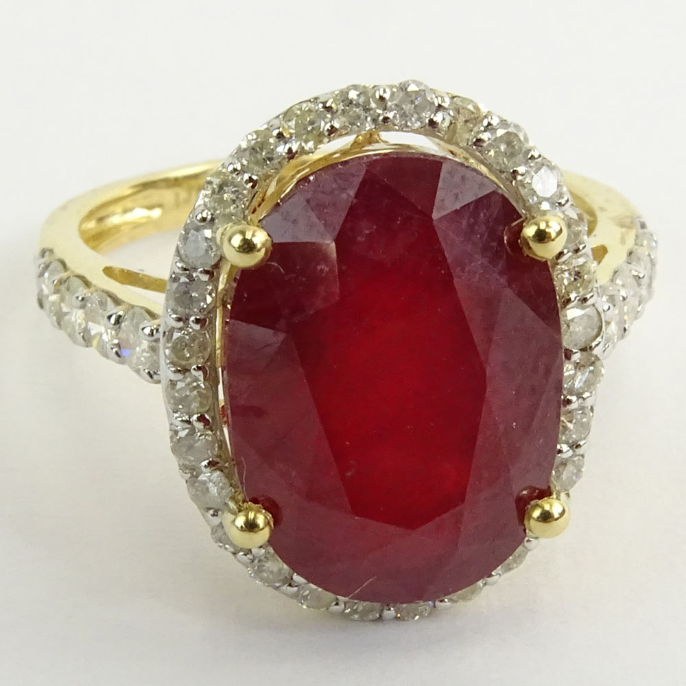 GGA Certified 9.05 Carat Oval Cut Ruby and 14 Karat Yellow Gold Ring