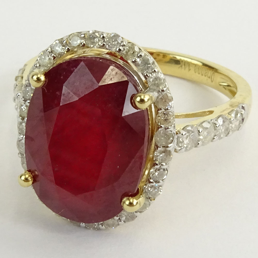 GGA Certified 9.05 Carat Oval Cut Ruby and 14 Karat Yellow Gold Ring