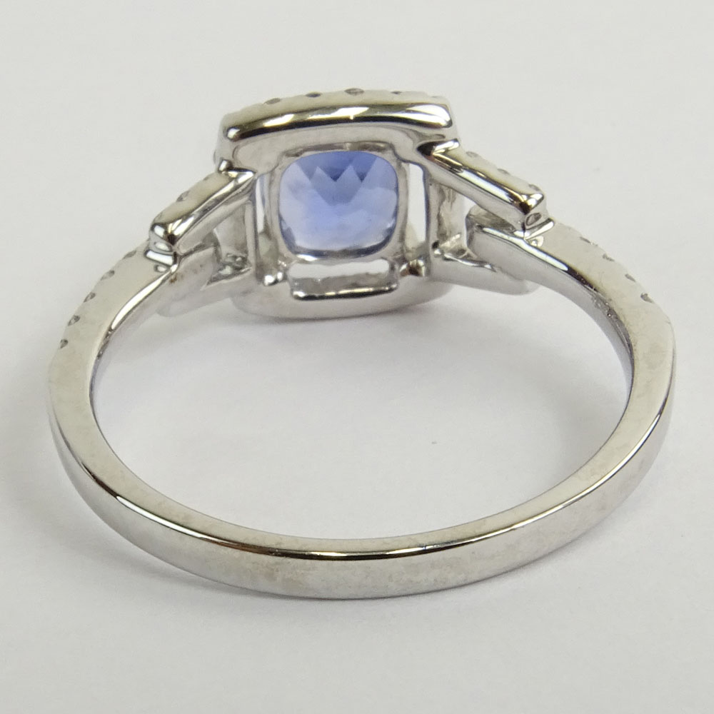AIG Certified 1.09 Carat Cushion Mixed Cut Sapphire  and 18 Karat White Gold Ring Accented with .42 Carat Round Brilliant Cut Diamonds.