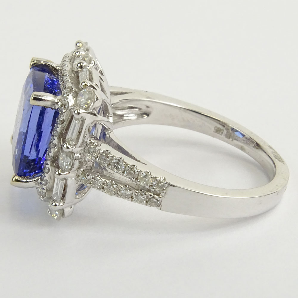 AIG Certified 5.14 Carat Square Cushion Cut Natural Tanzanite, .97 Carat Round Brilliant Cut and Baguette Diamond and 14 Karat White Gold Ring. 