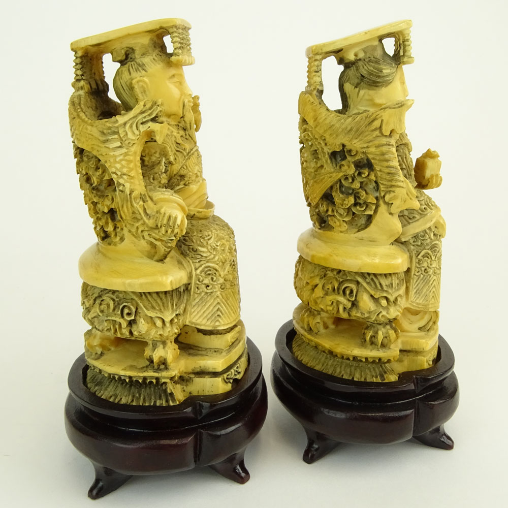 Pair of Antique Chinese Carved Ivory Emperor and Empress Figurines on Hardwood Stands.