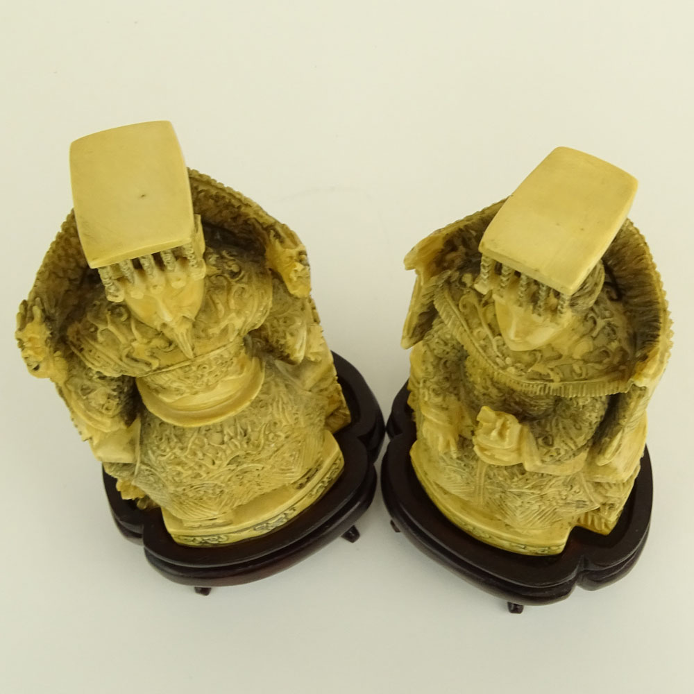 Pair of Antique Chinese Carved Ivory Emperor and Empress Figurines on Hardwood Stands.