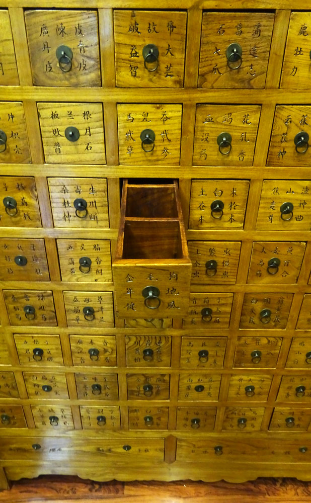 Modern Chinese Carved Hard Wood Apothecary Chest.