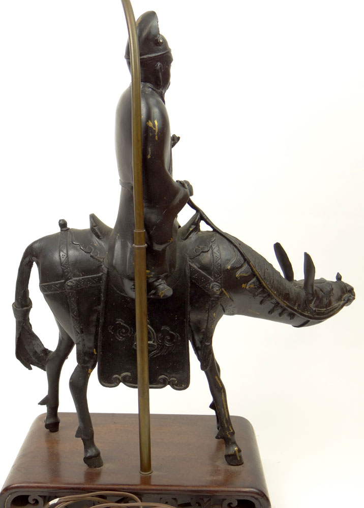 Early 20th Century Chinese Bronze "Scholar Riding a Donkey" Bearded Figure Wearing a Simple long Robe Holding a Scroll.