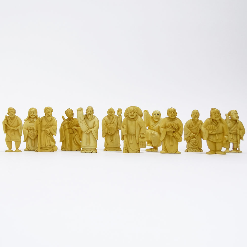 Collection of Twelve (12) Mid 20th Century Japanese Carved Ivory Netsukes.