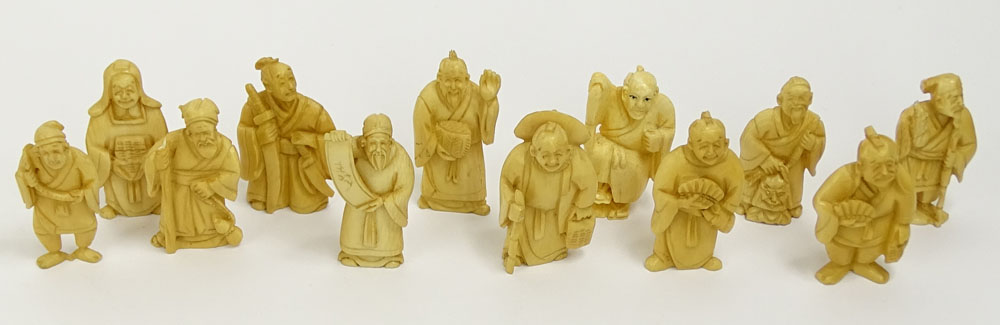 Collection of Twelve (12) Mid 20th Century Japanese Carved Ivory Netsukes.