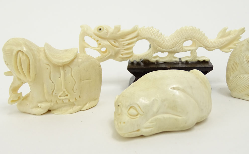 Collection of Seven (7) Mid 20th Century Japanese Carved Ivory Netsukes.