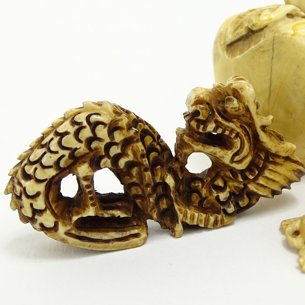 Collection Mid 20th Century Japanese Carved Ivory Including Six (6) Netsukes, Three (3) Snuff Bottles and One (1) Pendant. 