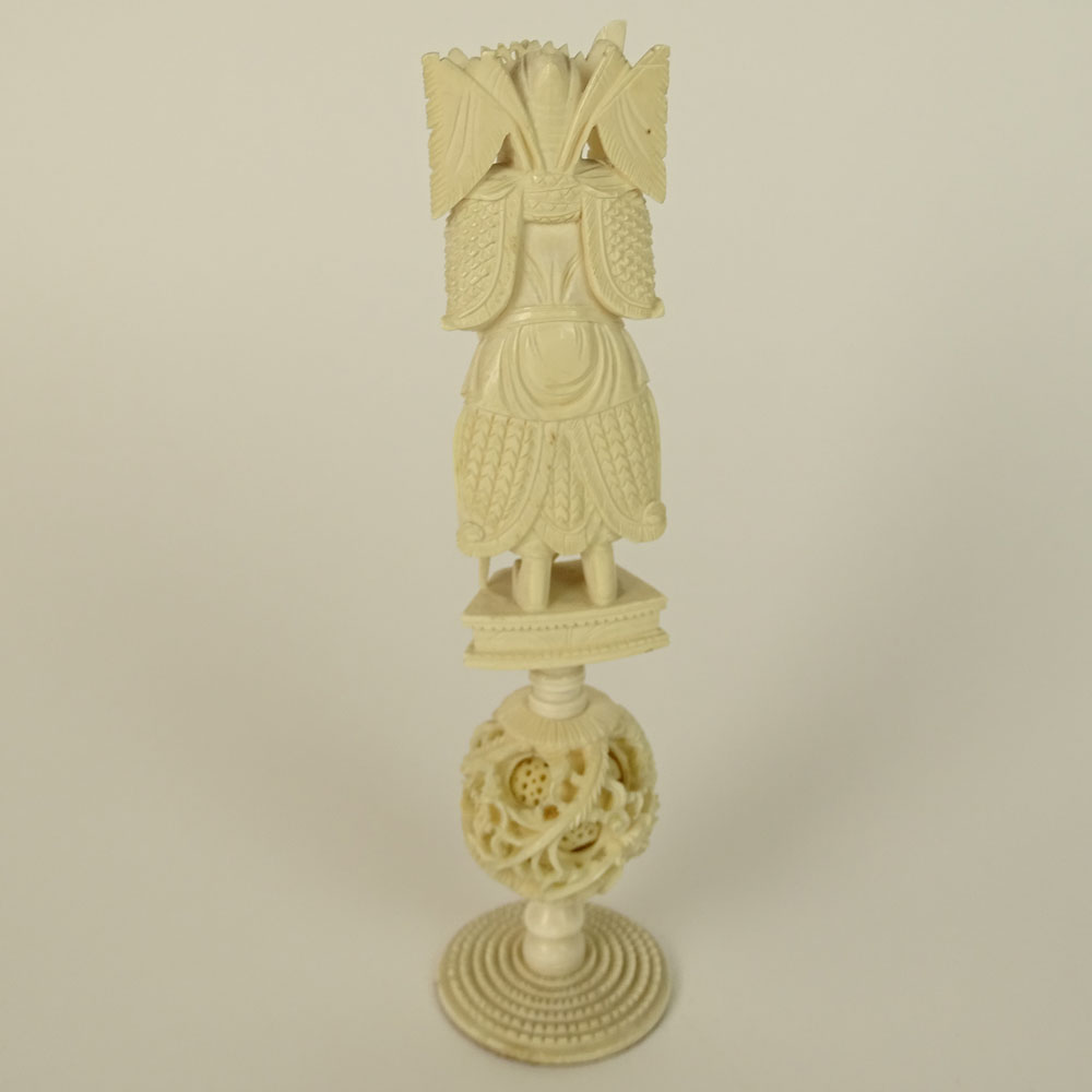 Chinese two part Ivory Carving, Warrior figure and Mystery Ball Base. 