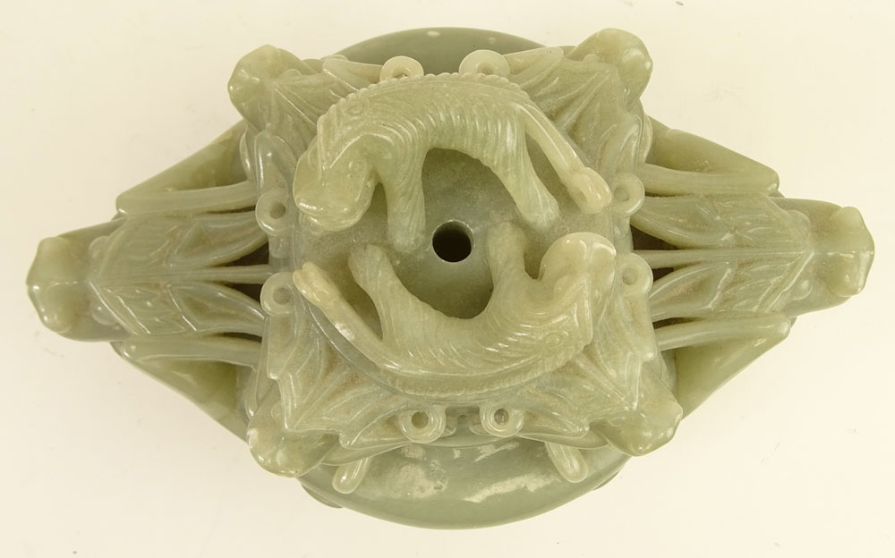 Mid Century Chinese Carved Jade Censer. Carved in high relief of mythical beasts. Ring handles.