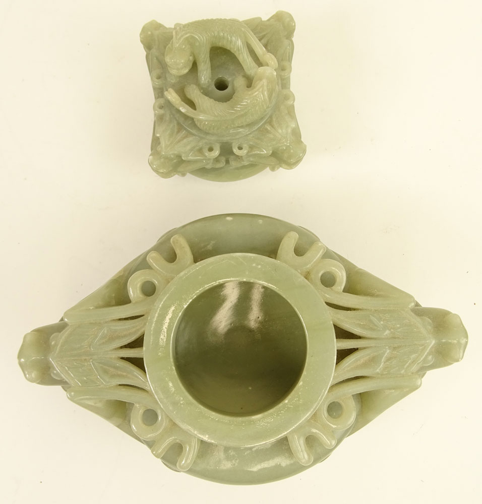 Mid Century Chinese Carved Jade Censer. Carved in high relief of mythical beasts. Ring handles.