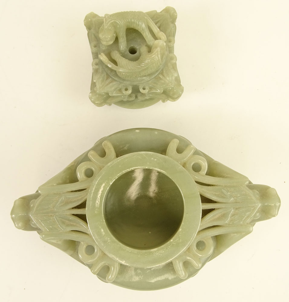Mid Century Chinese Carved Jade Censer. Carved in high relief of mythical beasts. Ring handles.