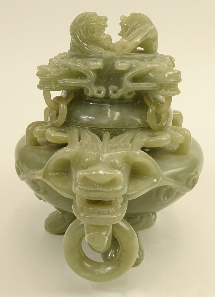 Mid Century Chinese Carved Jade Censer. Carved in high relief of mythical beasts. Ring handles.