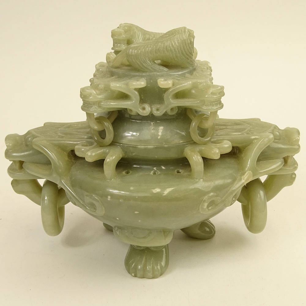 Mid Century Chinese Carved Jade Censer. Carved in high relief of mythical beasts. Ring handles.