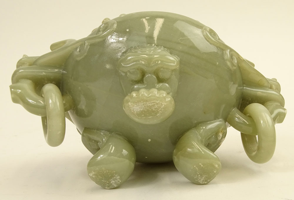 Mid Century Chinese Carved Jade Censer. Carved in high relief of mythical beasts. Ring handles.