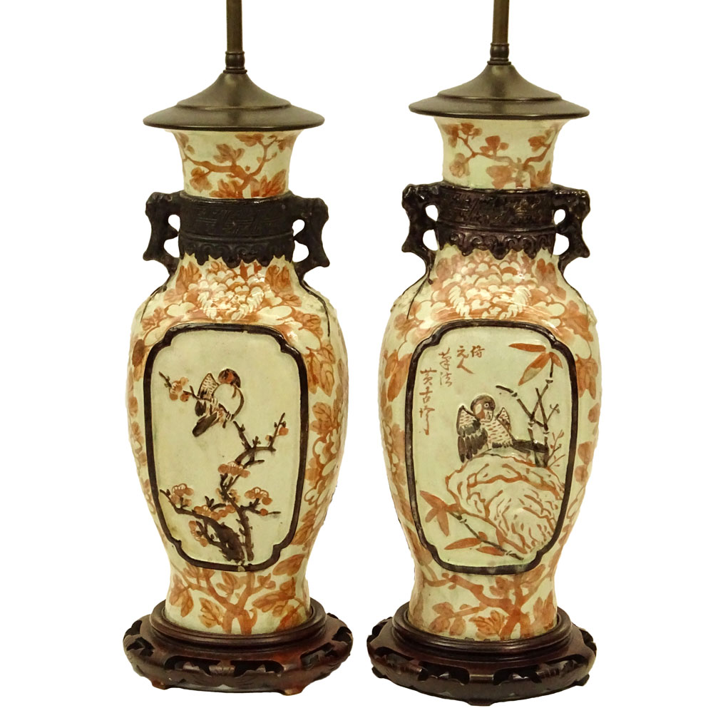 Pair of Chinese Pottery Urn Lamps on Hardwood Bases.