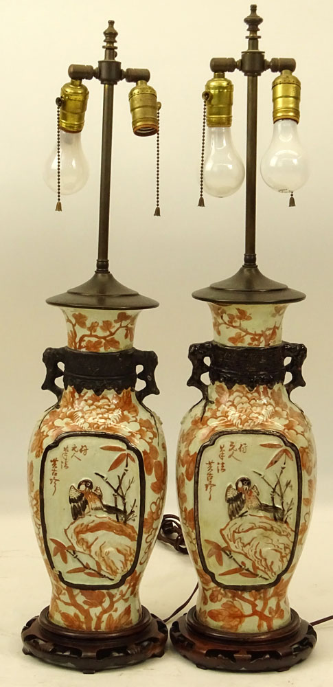 Pair of Chinese Pottery Urn Lamps on Hardwood Bases.