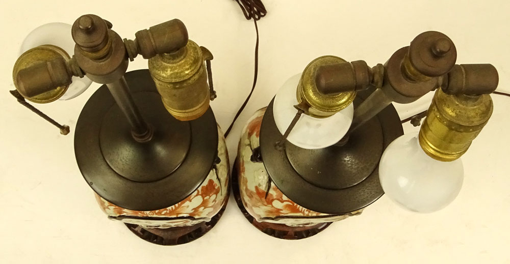 Pair of Chinese Pottery Urn Lamps on Hardwood Bases.