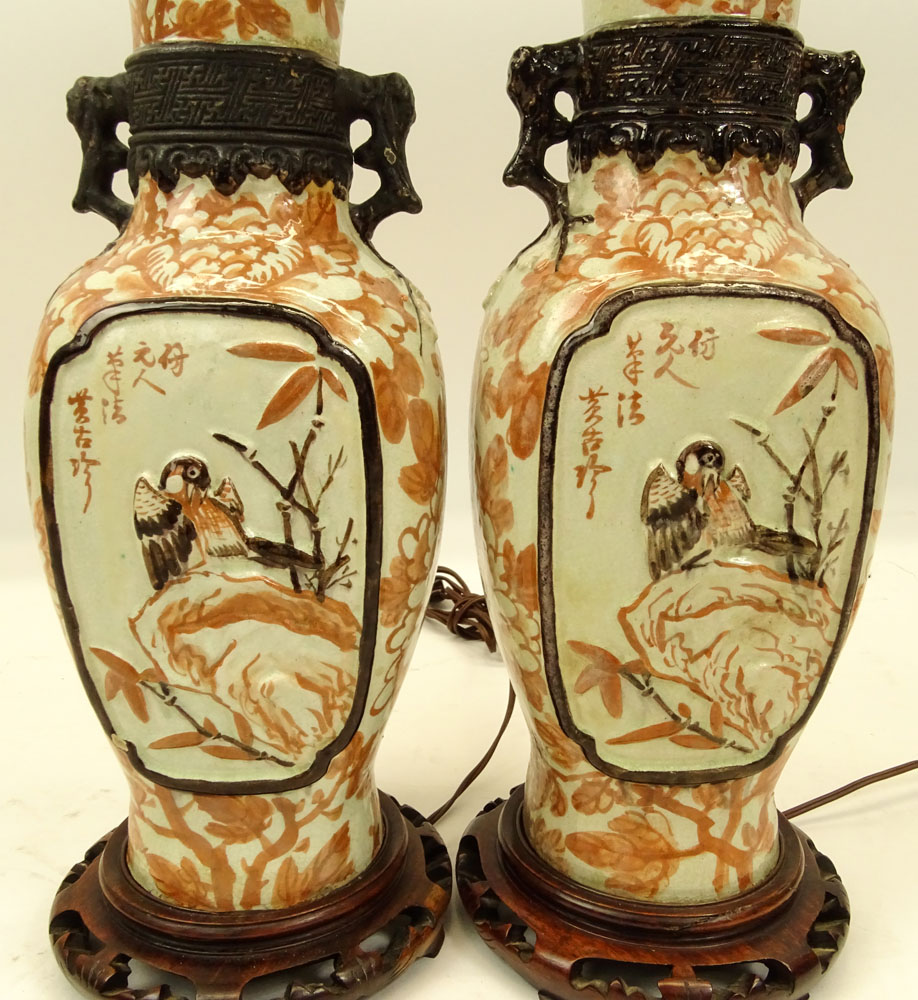 Pair of Chinese Pottery Urn Lamps on Hardwood Bases.