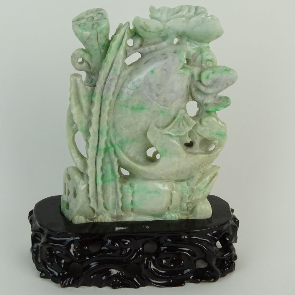 Chinese Jadeite Jade on Stand, Fish and Lotus Flower Motif. Carved hardwood stand.