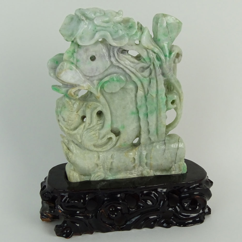 Chinese Jadeite Jade on Stand, Fish and Lotus Flower Motif. Carved hardwood stand.