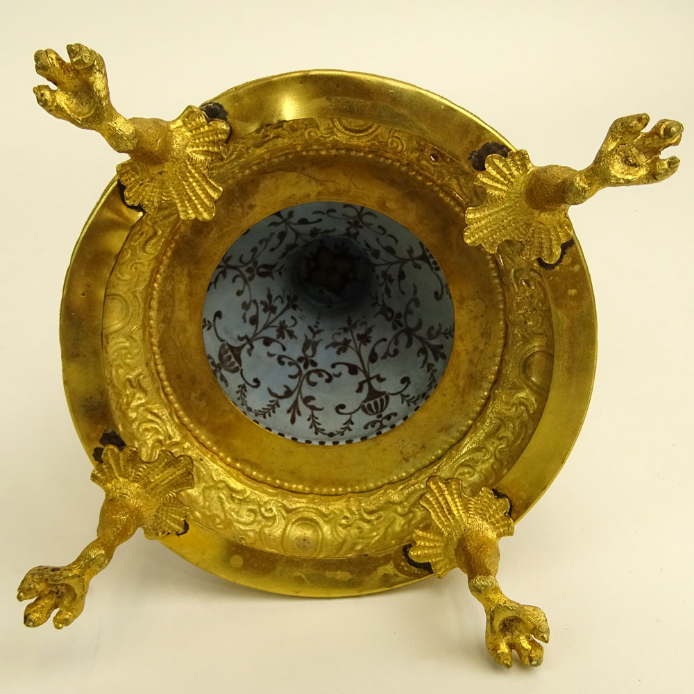 Early 20th Century Vienna Enamel and Gilt Metal Watch Holder. Unsigned. Losses/Damages to finial and to watch holder. Please examine this lot carefully before bidding. Measures 13-1/2" H (without bird finial), 4" W at base. Shipping $48.00 (estimate $500-